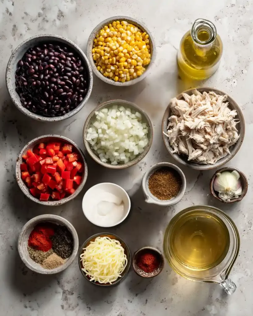 Chicken Taco Soup – Easy, Creamy, and Full of Flavor 6 chicken taco soup ingredients flatlay