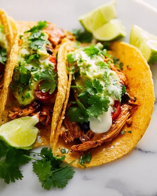 25 Summer Crockpot Recipes for Easy Family Dinners 4 crockpot shredded chicken tacos 2026 04 25 220438 e1778264358527