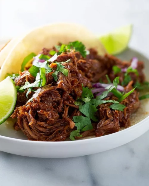 25 Summer Crockpot Recipes for Easy Family Dinners 3 homemade barbacoa beef slow cooker 2026 04 25 220435 e1778433365847